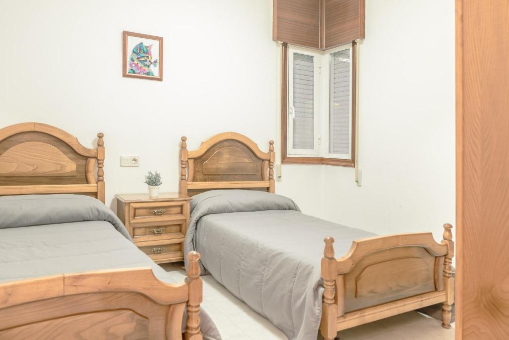 camas gemelas habitación interior