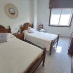 Camas gemelas apartamento