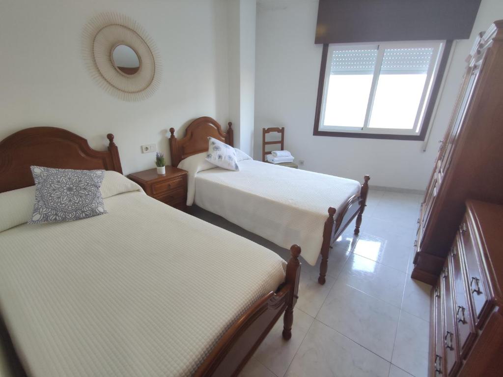 Camas gemelas apartamento